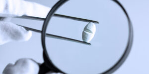 medicine drug in a magnifying glass